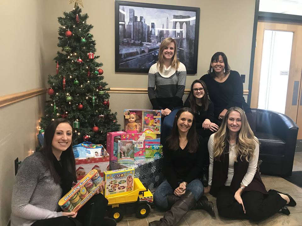 2018 Toy Drive photo with Paradigm team