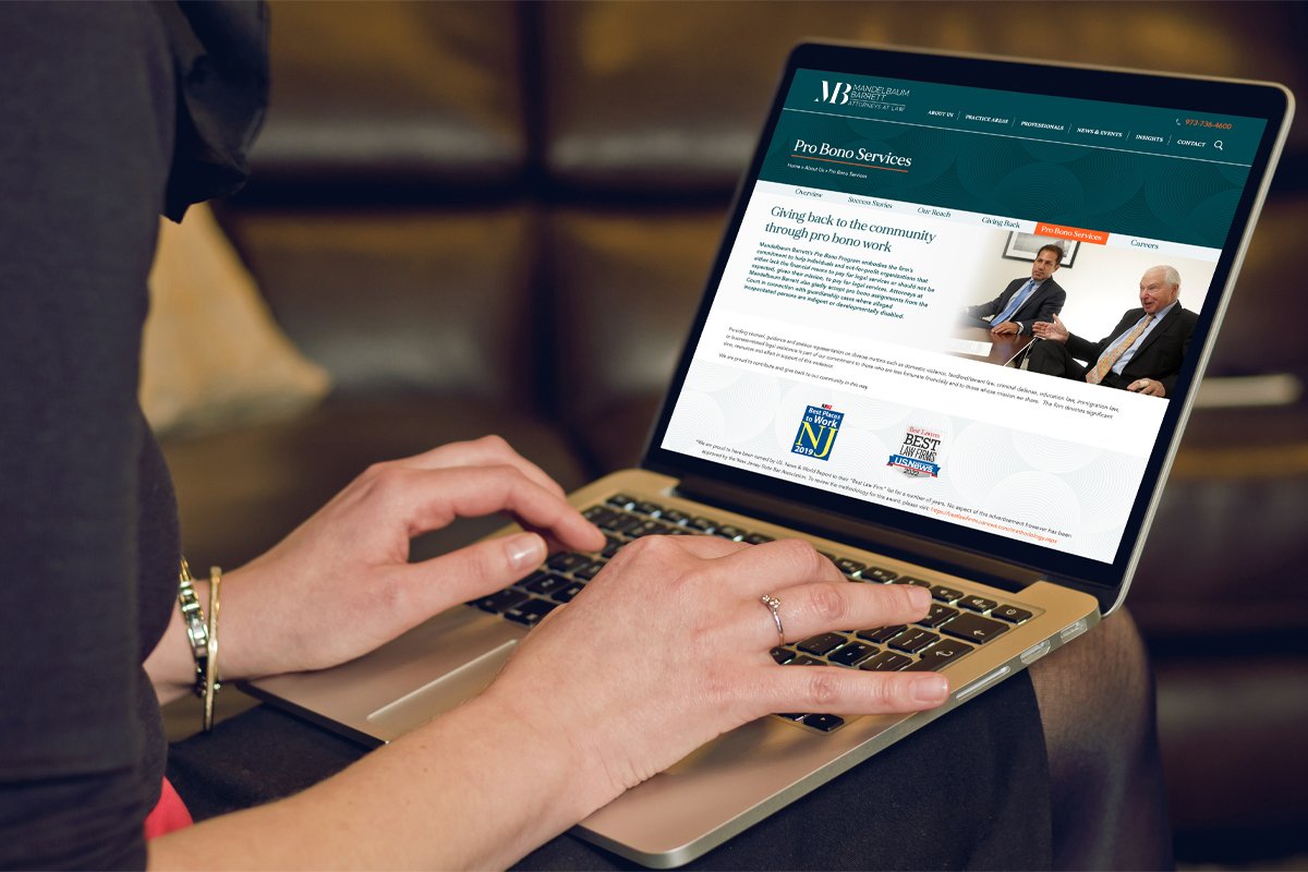 Mandelbaum Barrett lap top Lap top computer with Mandelbaum Barrett homepage displayed on screen