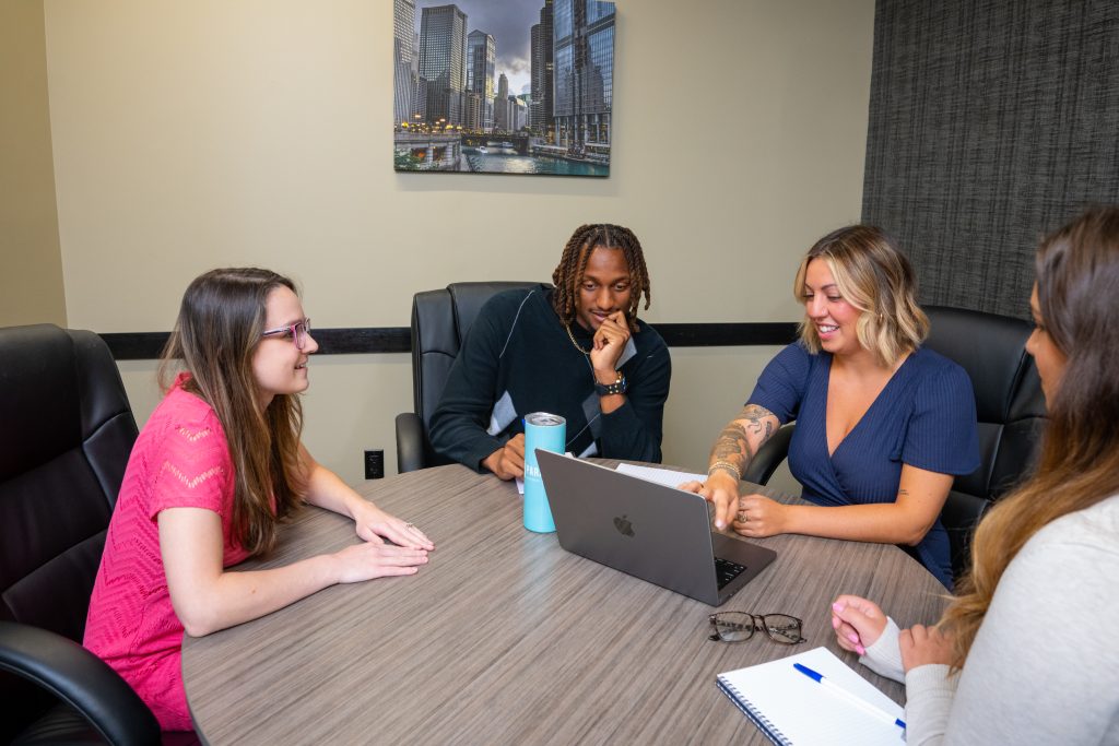 Marketing team discussing social media marketing strategy
