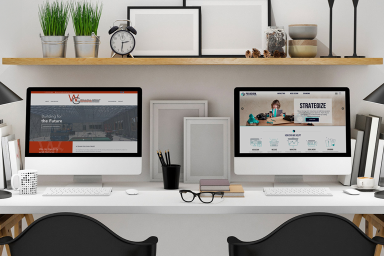 PARADIGM MARKETING & DESIGN EARNS TWO 2019 AMERICAN WEB DESIGN AWARDS FROM GDUSA